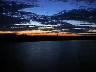 Закат над ставком у села