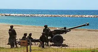 Расчёт гаубицы L118 Артиллерийской группы Испанского легиона в День Вооружённых сил. 28 мая 2011 года.