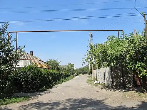 въезд с улицы Александра Тышлера