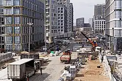 Вид в створ улицы Петра Кончаловского с моста через затон Новинки