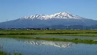 Вид на вулкан Тёкай с юга