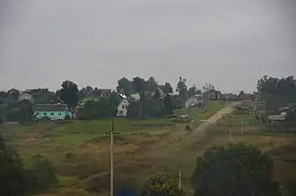 Вид на деревню с шоссе Москва — Рига