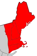 "A close-up image showing all six of the New England states highlighted in red on a political map."