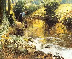 На берегу реки.