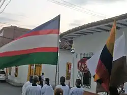 Флаг во время Рождественской процессии