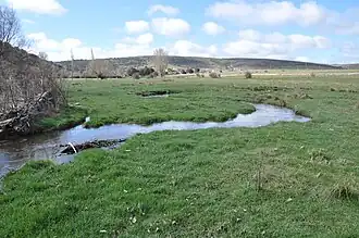 Река Альмар и Ортигоса на заднем плане