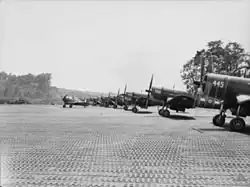 Piston-engined fighter planes on marston matting