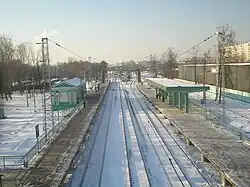 Вид со снесённого моста на снесённые платформы