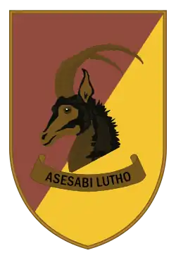 Отличительный знак Родезийского бронетанкового корпуса, с изображением головы чёрной антилопы.