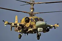 Серийный Ка-52 (бортовой № 34, серийный № 02-04) первых выпусков с 4 узлами подвески вооружения, оснащённый ГОЭС‑451. Отсутствуют СОЭП, УФ-пеленгаторы пуска ракет и устройства выброса пассивных помех БКО (ЭВУ не установлены), 12 июля 2015 года.