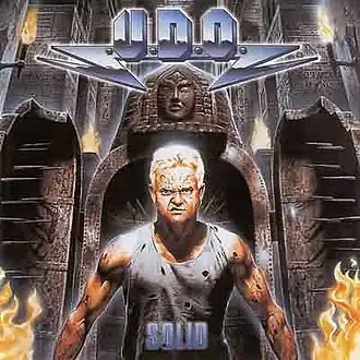 Обложка альбома U.D.O. «Solid» (1997)