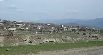 Село и пещеры на его окраине