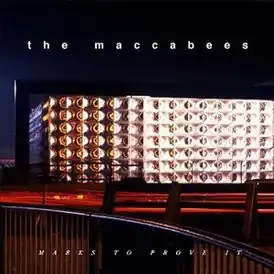 Обложка альбома The Maccabees «Marks to Prove It» (2015)