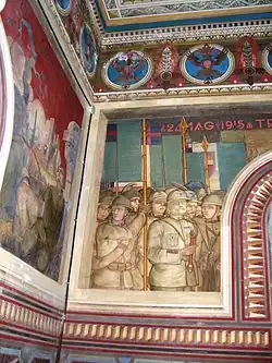 Фреска кисти Тито Кини[итал.] с изображением Пекори-Джиральди в часовне на горе Пазубио.