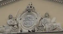 Барельеф с польским орлом и литовской погоней.