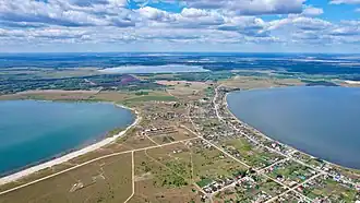 Вид с высоты, Тыгиш на дальнем плане