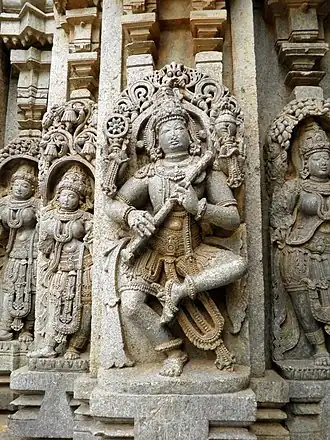 Танцующий Вишну в образе Венугопала с флейтой