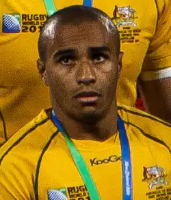 Уилл Гения с медалью чемпионата мира 2011 года