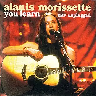 Обложка сингла Аланис Мориссетт «You Learn» (2000)