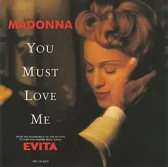 Обложка сингла Мадонны «You Must Love Me» (1996)