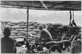 Американский советник в камуфлированной форме с рисунком М1942, Вьетнам, 1964