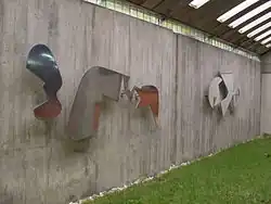 Arp, 1956: 'Silhouettes in relief' wall-sculpture; location: Central University of Venezuela, Faculty of Humanities and Education