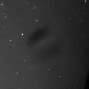 Closeup of image distortion from a small water droplet