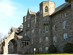 Stone facade and entryway of a multistory building