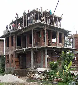 Building a house nearby the street between Kathmandu and-Nagarkot
