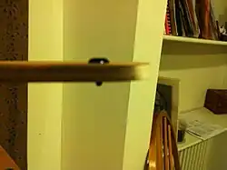 Photo 7:Pin that attaches through connector arm to grommet with crazy glue.